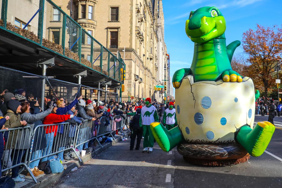 Photographs of balloons, floats, and performers at the parade